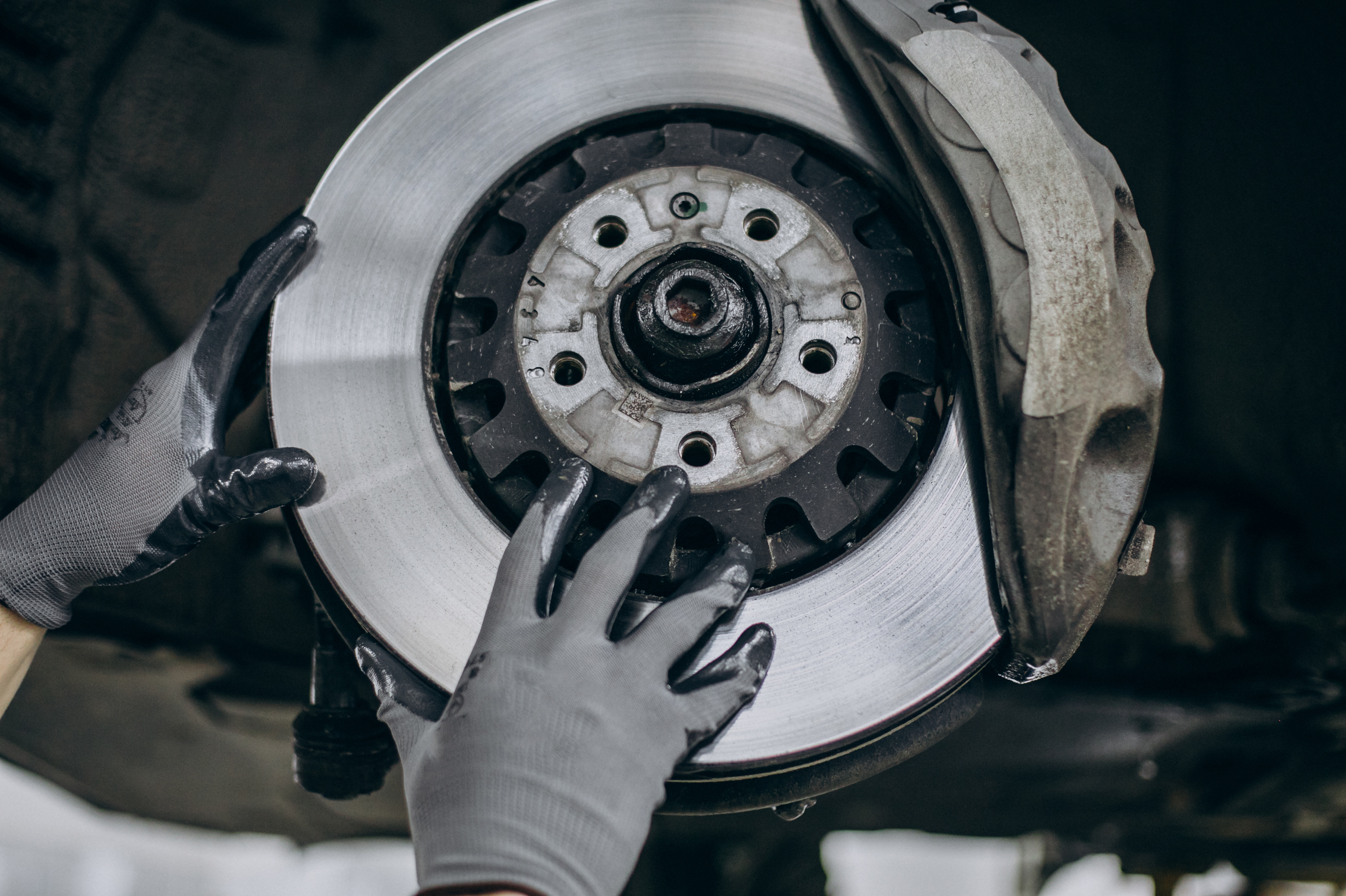 mechanic-changing-brake-discs-car-service