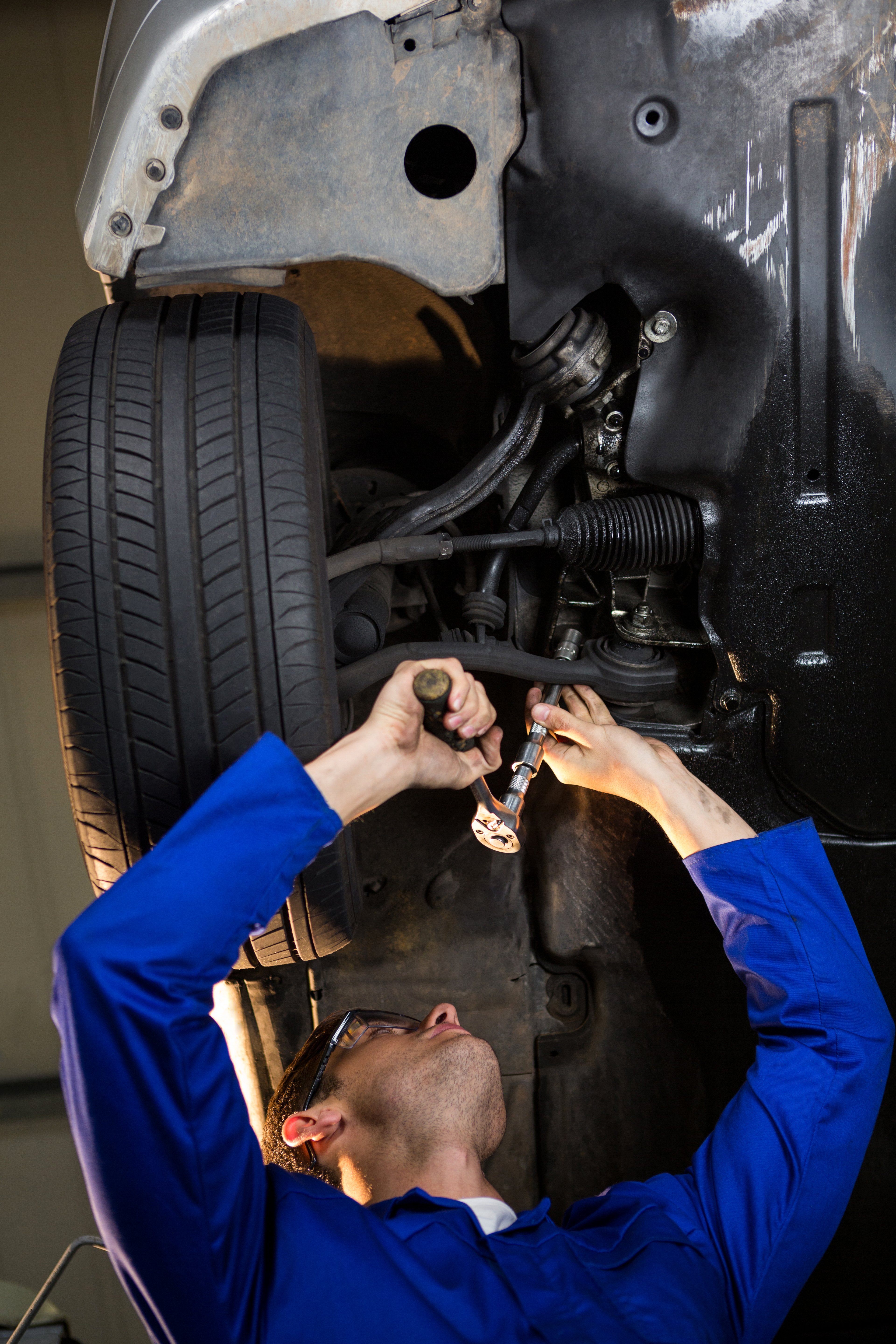 mechanic-servicing-car