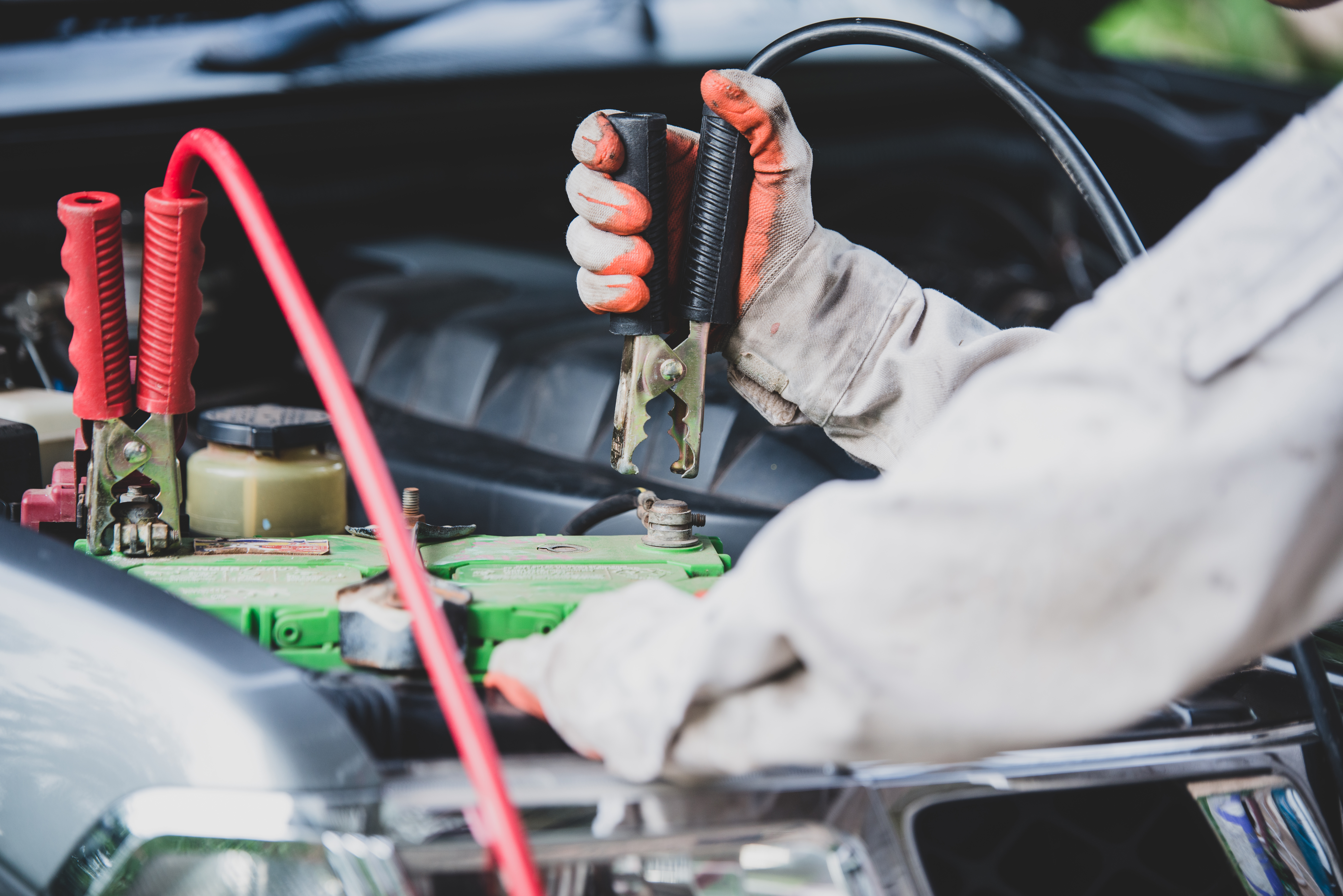 car-repairman-wearing-white-uniform-standing-holding-wrench-that-is-essential-tool-mechanic